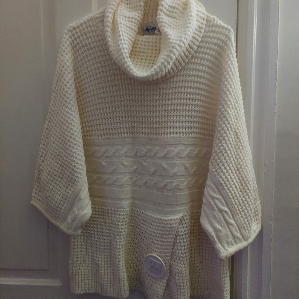 A cream sweater ,size 3x  brand Caren Sport